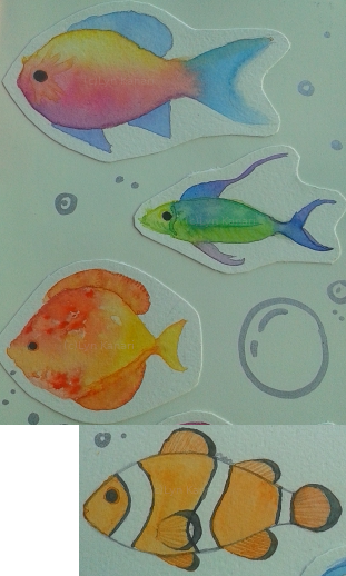 Four colorful, happy watercolor fishes.